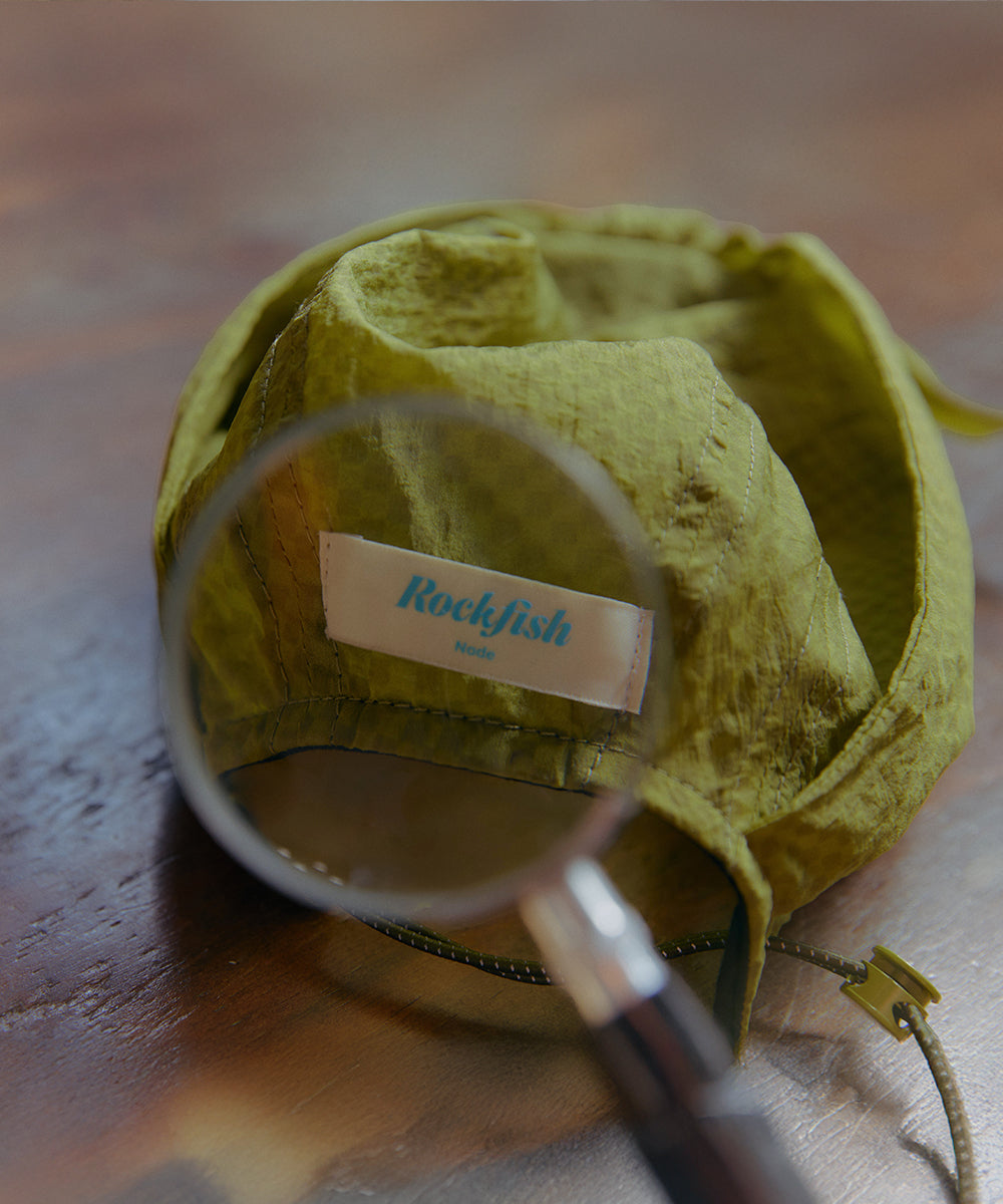 KNOT CAP - OLIVE CHECK(OV) FREE